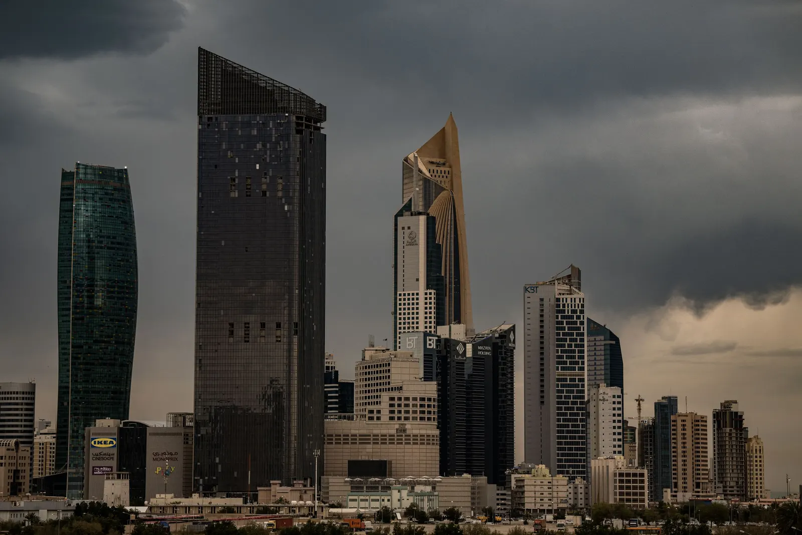 Towers of Kuwait City under cloud